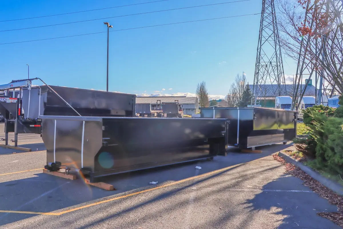 Roll-off dumpster ready for waste disposal at job site for Construction Dumpster Rental in Dale City